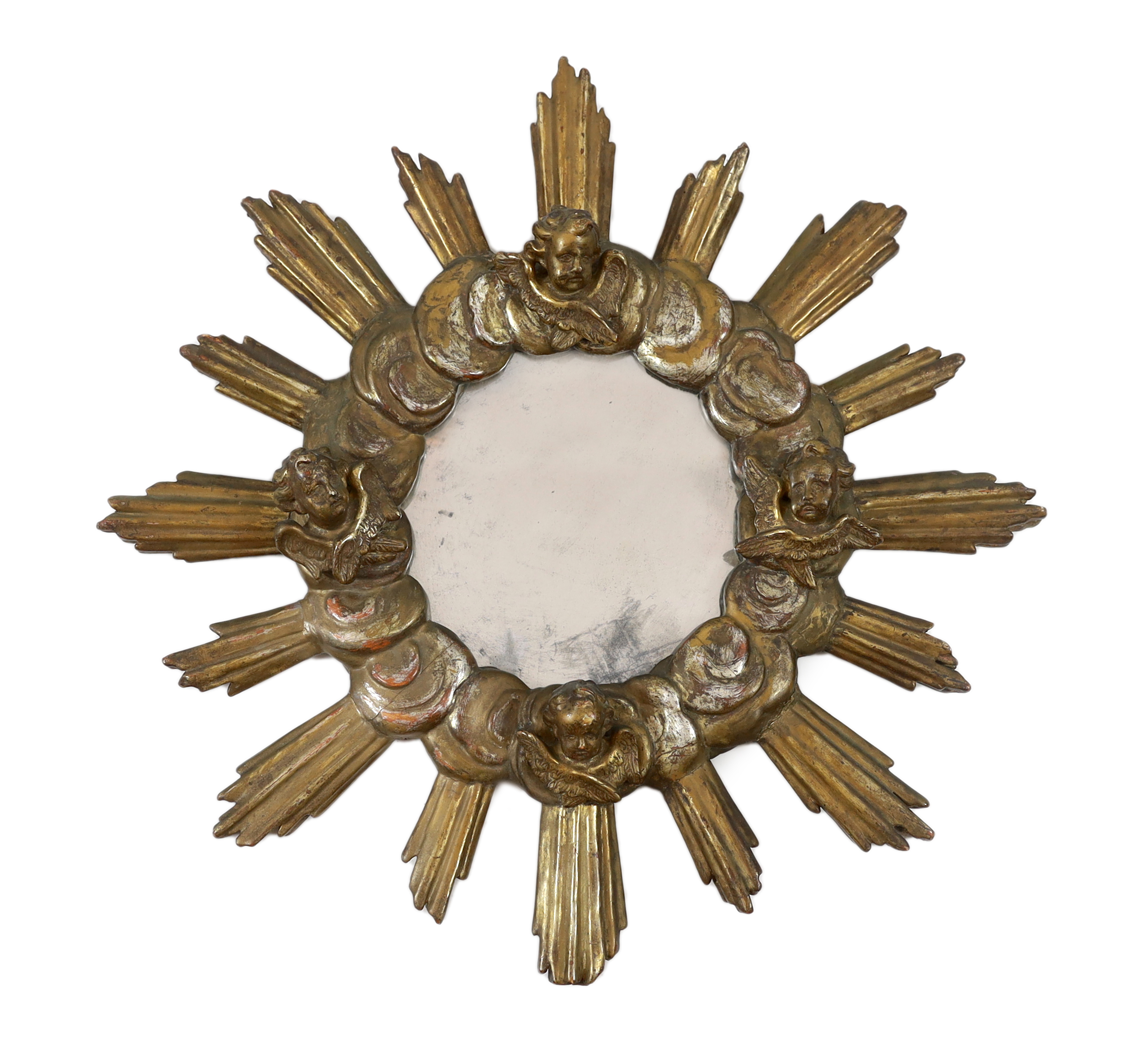 A Baroque Revival silvered and giltwood sunburst wall mirror